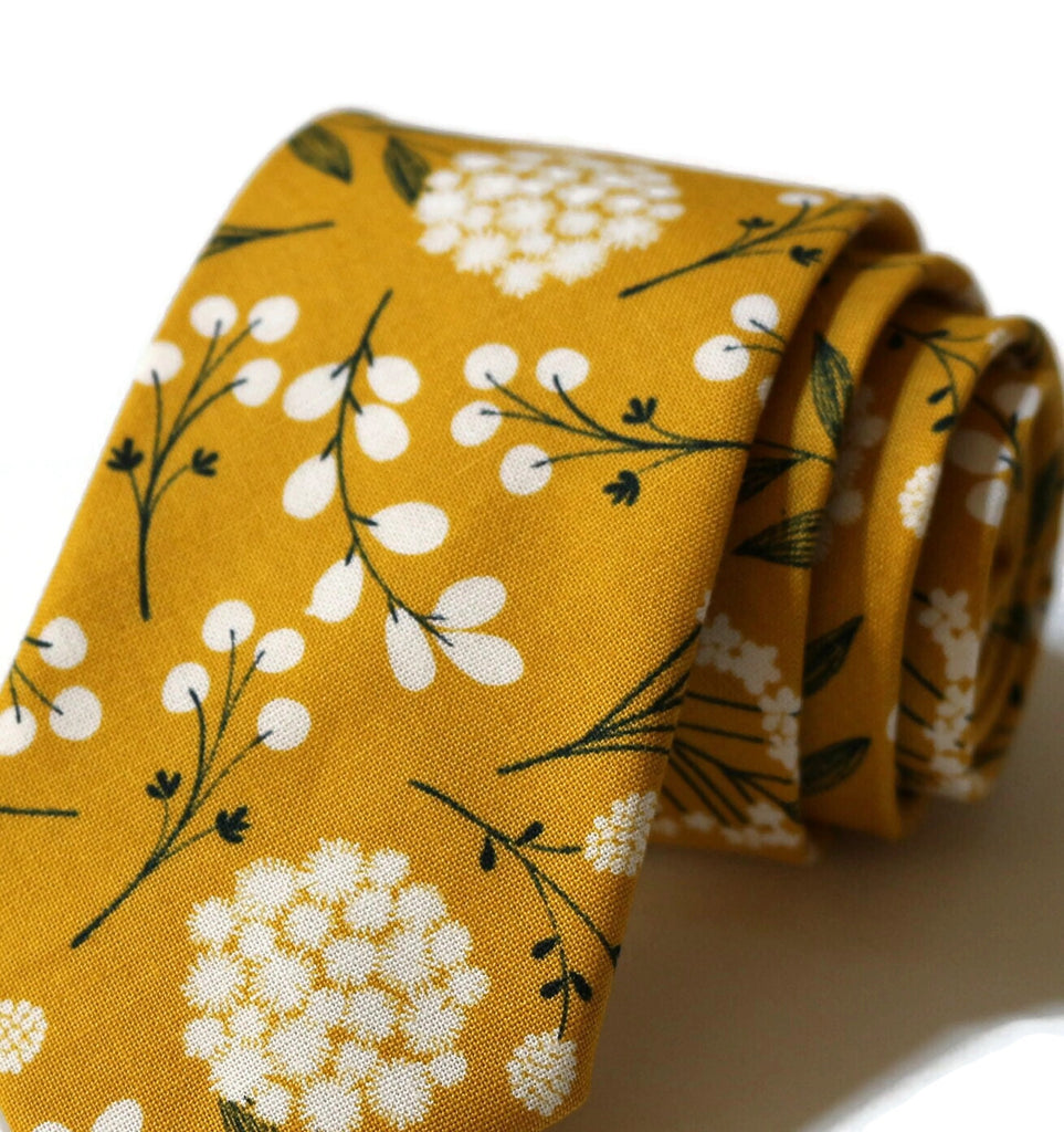 Mustard Floral Necktie featuring vibrant floral patterns, perfect for handcrafted neckties and wedding accessories for men.