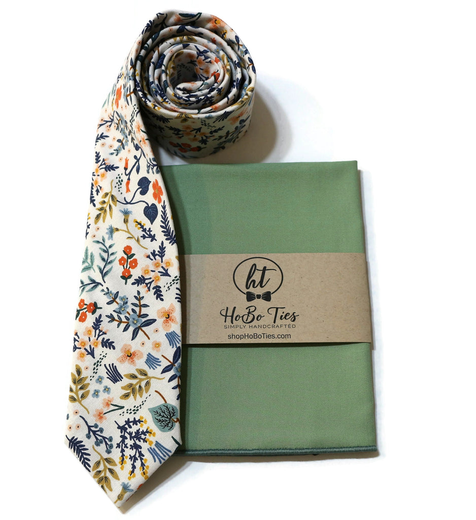 White Metallic Wildwood Floral Necktie with matching green pocket square, handcrafted neckties for men and boys.
