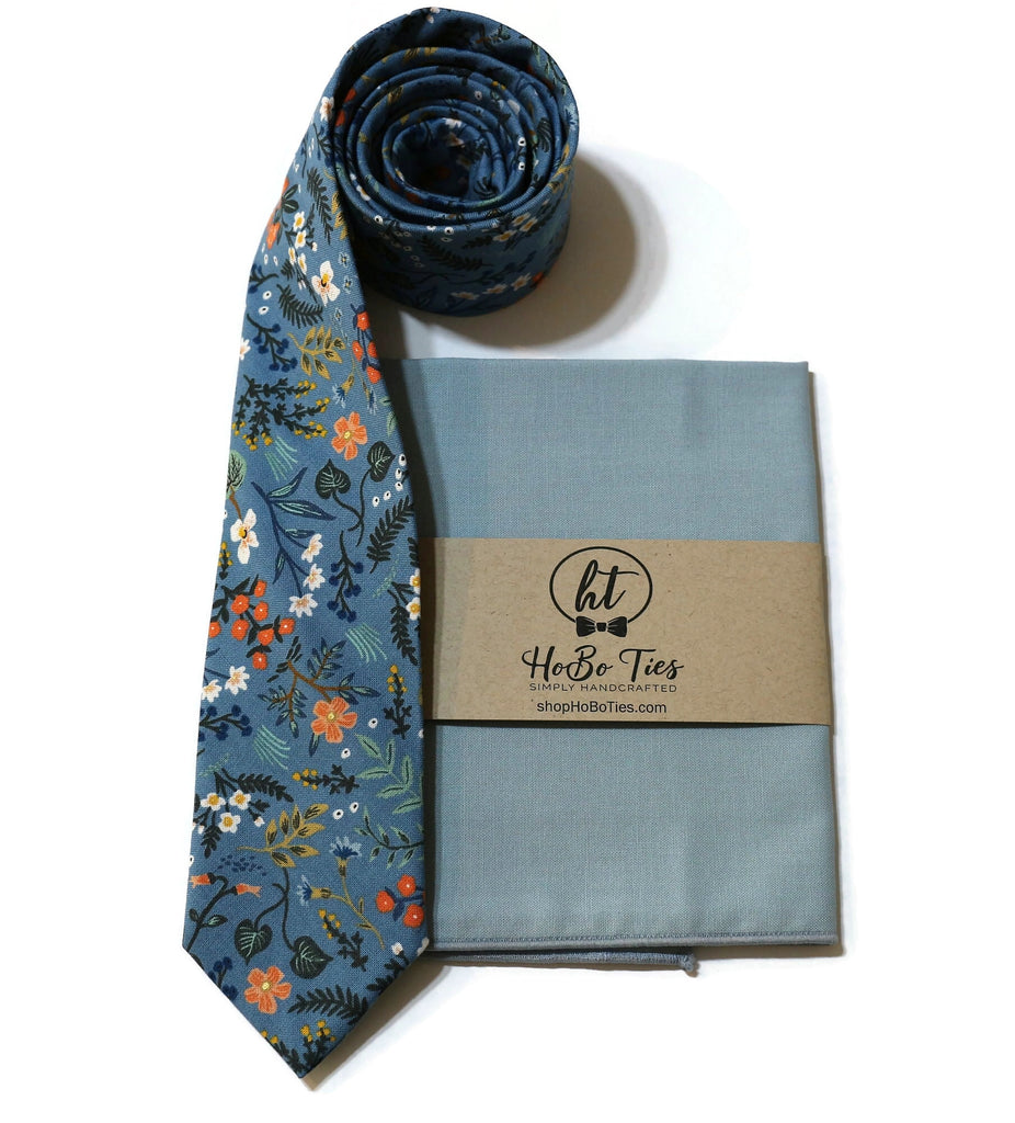 Blue Metallic Wildwood Floral Necktie with matching pocket square, a must-have for men’s wedding accessories.