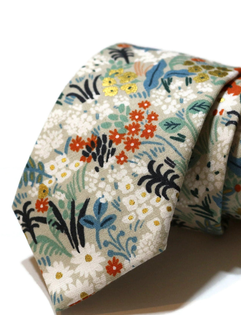 Flax Metallic Meadow Floral Necktie, a handcrafted necktie showcasing vibrant floral patterns for men and boys.