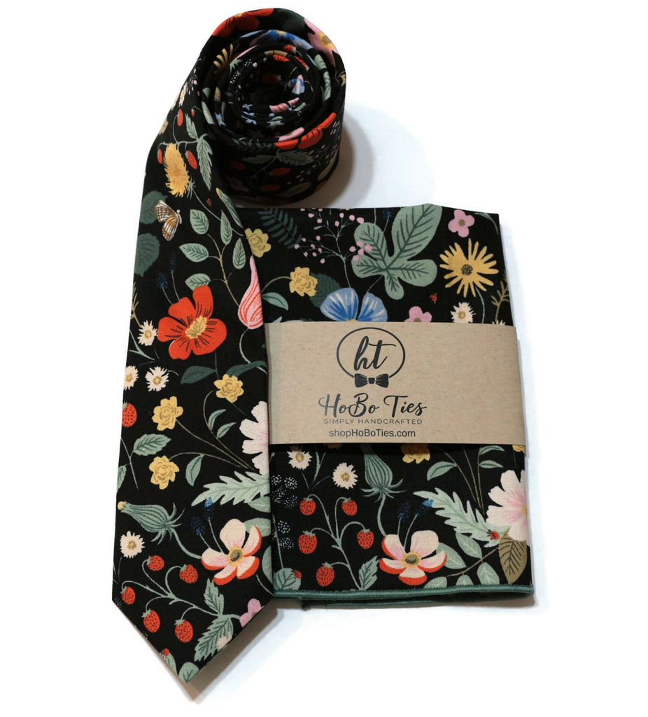 Black Strawberry Fields Floral Necktie, handcrafted neckties with floral patterns, perfect formal wear accessories for men.