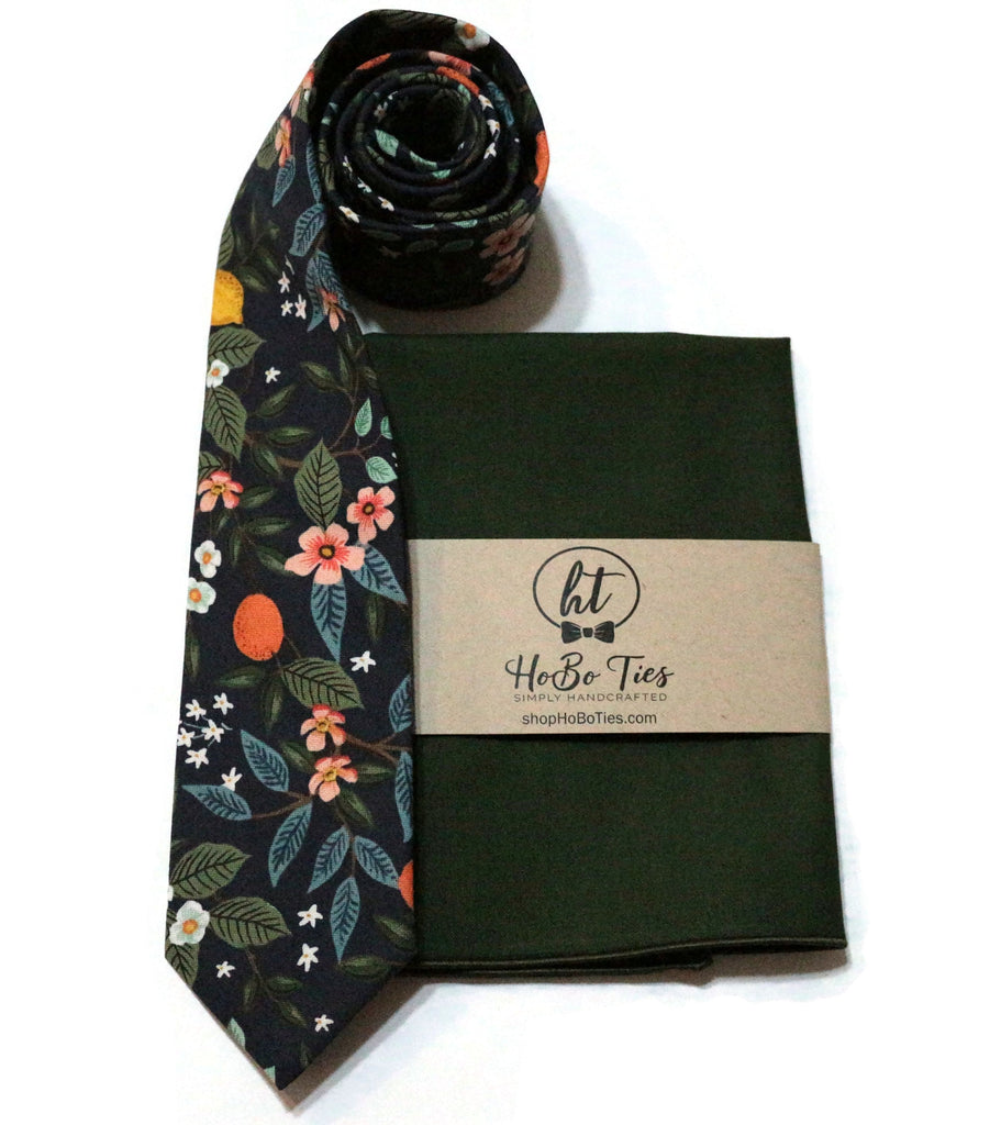 Navy Citrus Grove Floral Necktie with matching pocket square, handcrafted neckties for men and boys, unique floral patterns.