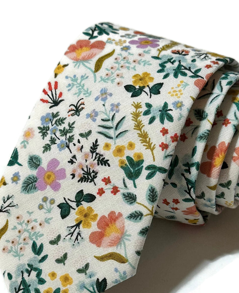 White Bramble Fields Floral Necktie showcasing vibrant floral patterns, perfect for men's formal wear and handcrafted neckties.