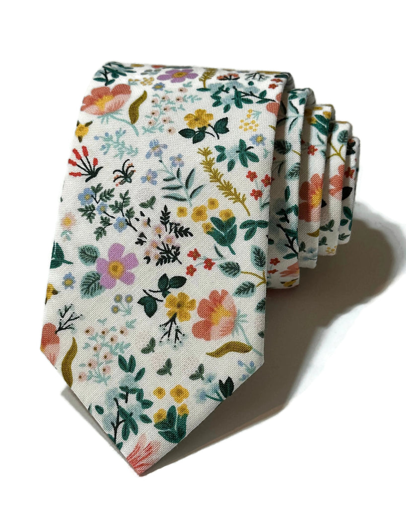 White Bramble Fields Floral Necktie showing vibrant floral patterns, a perfect choice for handcrafted neckties and wedding accessories.