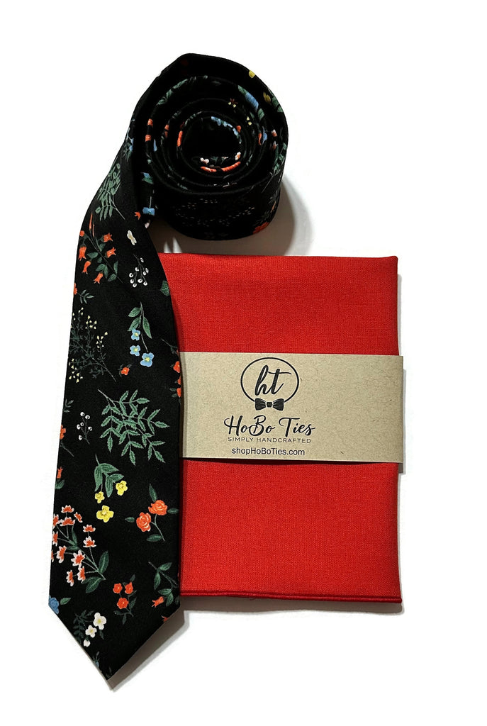 Black Hawthorne Floral Necktie with red pocket square, a perfect accessory for men's formal wear and weddings.