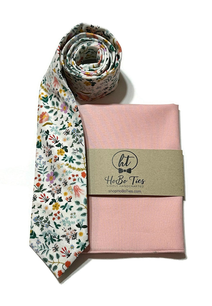 White Bramble Fields Floral Necktie paired with a pink pocket square, perfect for wedding accessories for men.