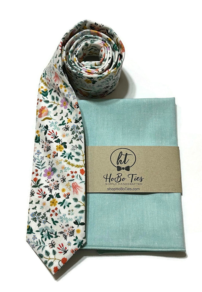 White Bramble Fields Floral Necktie paired with a matching pocket square, handcrafted neckties for men.