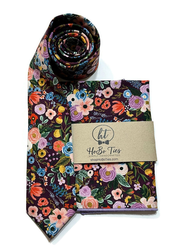 Eggplant Garden Party Petite Floral Necktie with floral patterns and matching pocket square, handcrafted neckties for men.