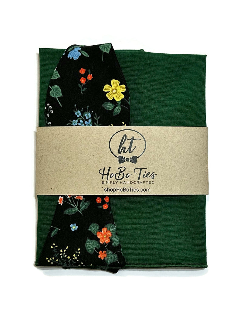 Black Hawthorne Floral Bow Tie with green fabric and packaging; handcrafted men’s accessories.
