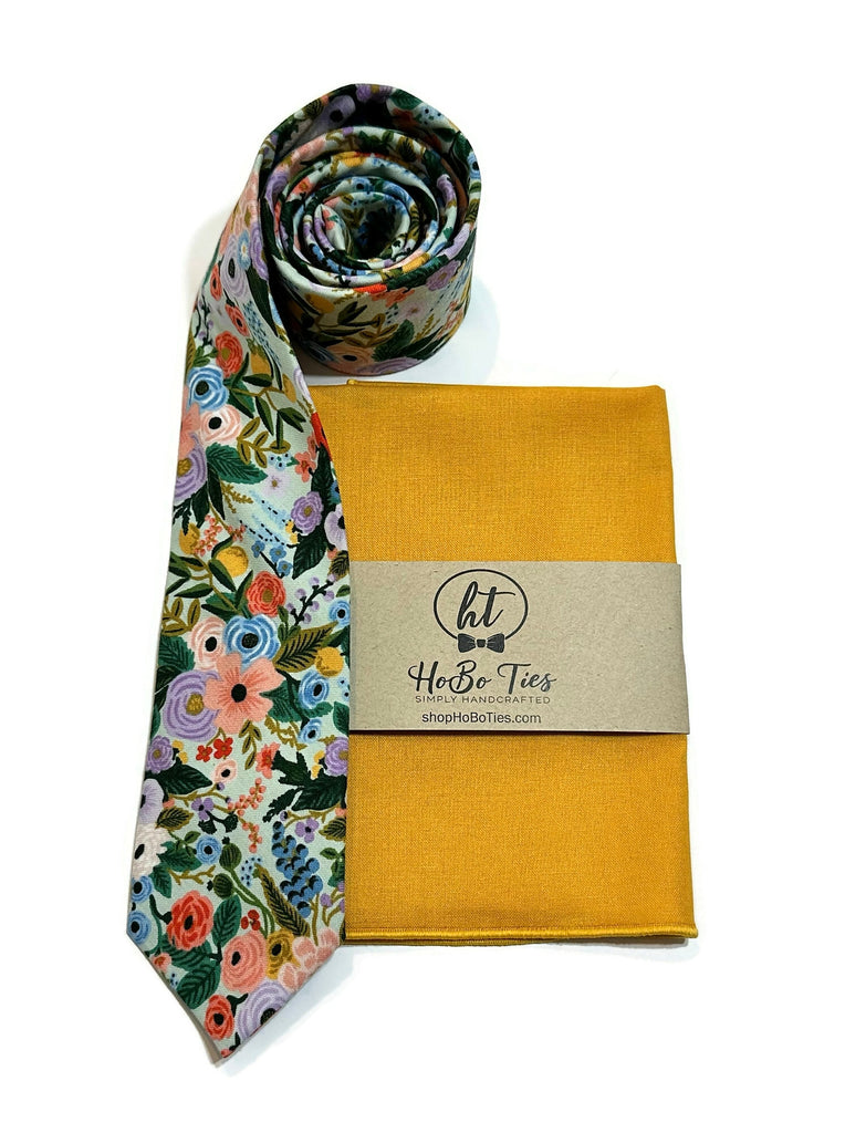 Mint Garden Party Petite Floral Necktie paired with a mustard pocket square, showcasing handcrafted neckties and wedding accessories for men.