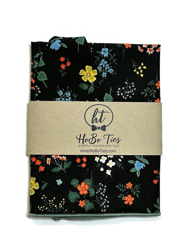 Black Hawthorne Floral Bow Tie, a stylish handcrafted bow tie with floral pattern, perfect for men’s formal wear and weddings.