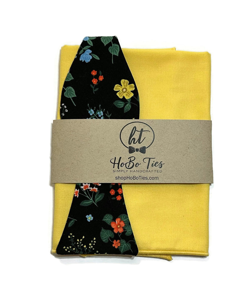 Black Hawthorne Floral Bow Tie with yellow pocket square, handcrafted men’s accessories, perfect for weddings and formal wear.