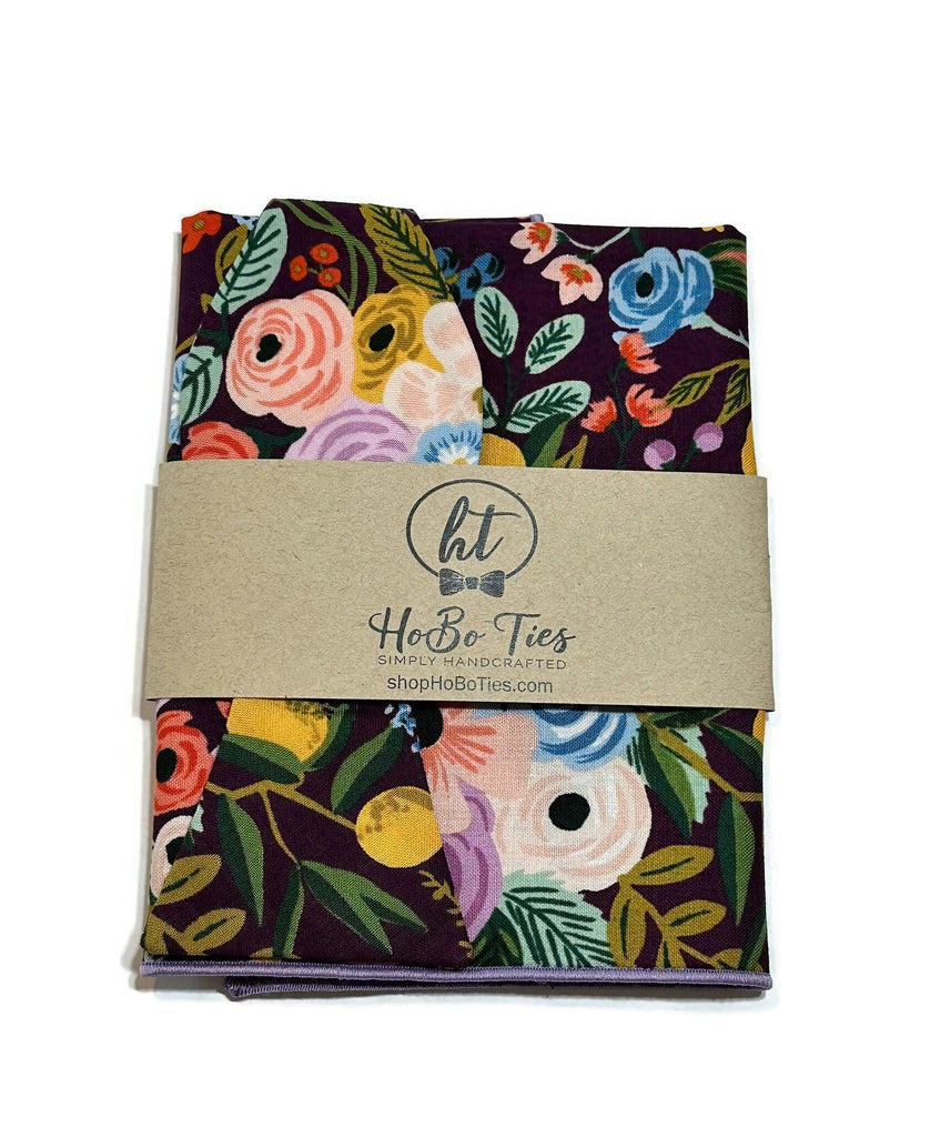 Eggplant Garden Party Floral Bow Tie showcasing vibrant floral patterns, handcrafted for style and confidence in men's accessories.