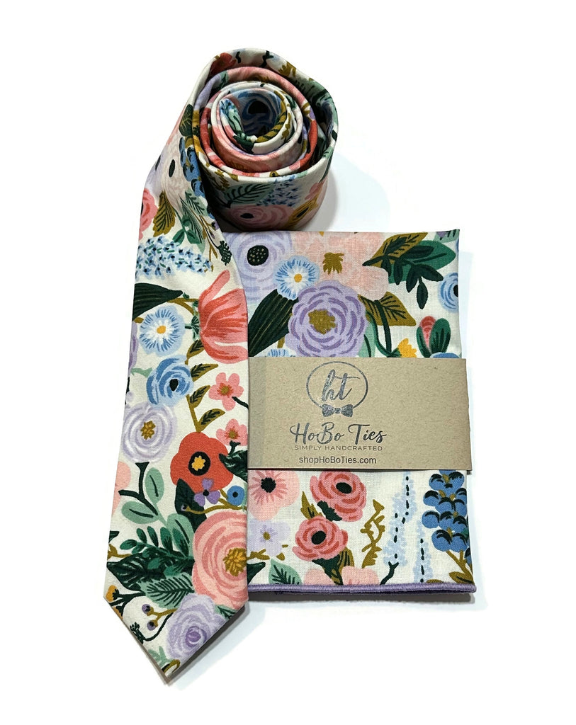 Ivory Garden Party Floral Necktie with vibrant floral design, handcrafted neckties, handmade accessories, perfect for weddings.