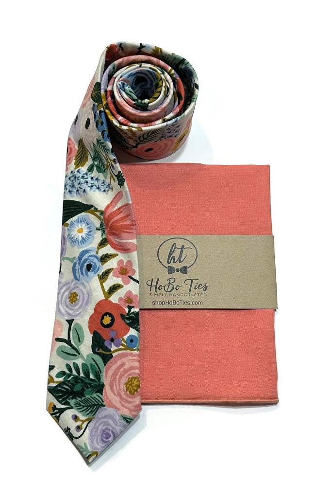 Ivory Garden Party Floral Necktie with matching pocket square showcasing vibrant floral design.
