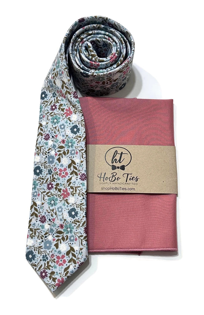 Sky Blue Happy Petals Floral Necktie with matching pocket square, handcrafted neckties and men’s accessories.
