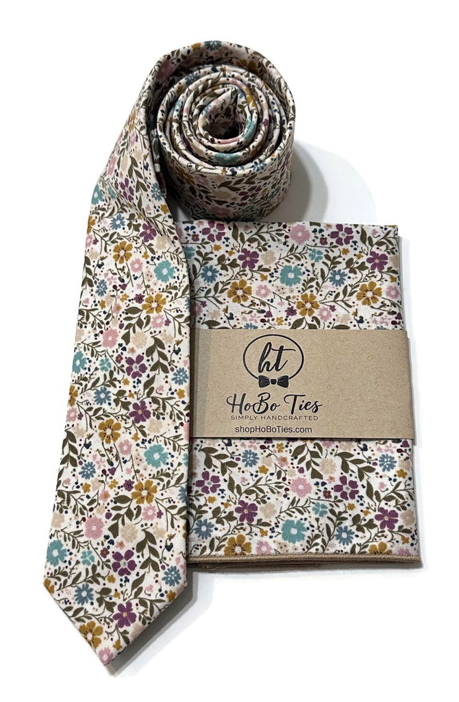 Tea Blend Happy Petals Floral Necktie displayed with matching pocket square for men’s formal wear accessories.