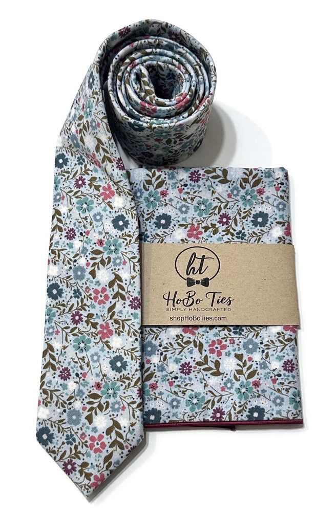 Sky Blue Happy Petals Floral Necktie and pocket square set, handcrafted neckties, unique floral patterns.