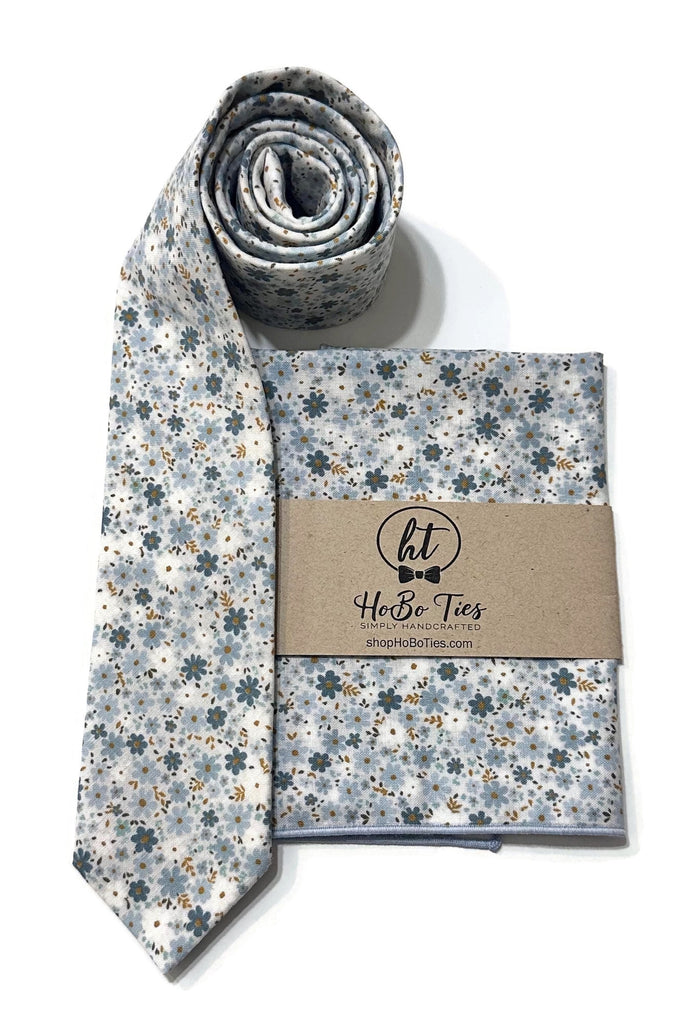 Powder Blue Field of Blooms Floral Necktie with matching pocket square, perfect for men’s formal wear accessories.