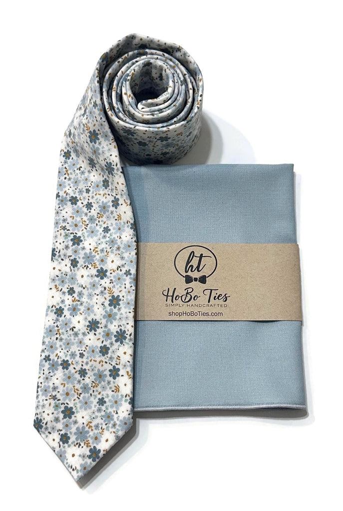 Powder Blue Field of Blooms Floral Necktie with matching pocket square, handcrafted neckties for men.