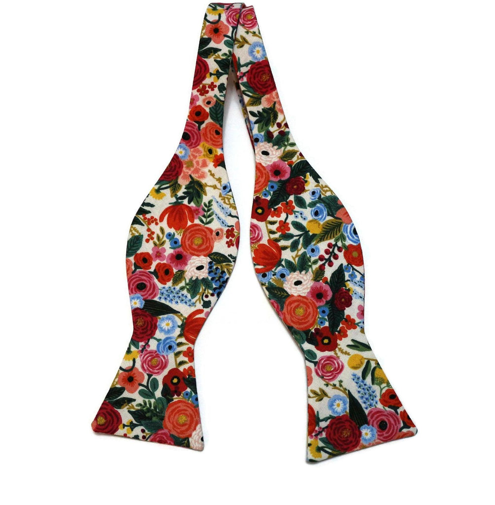 Cream Garden Party Petite Floral Bow Tie made with handcrafted neckties and vibrant floral patterns.