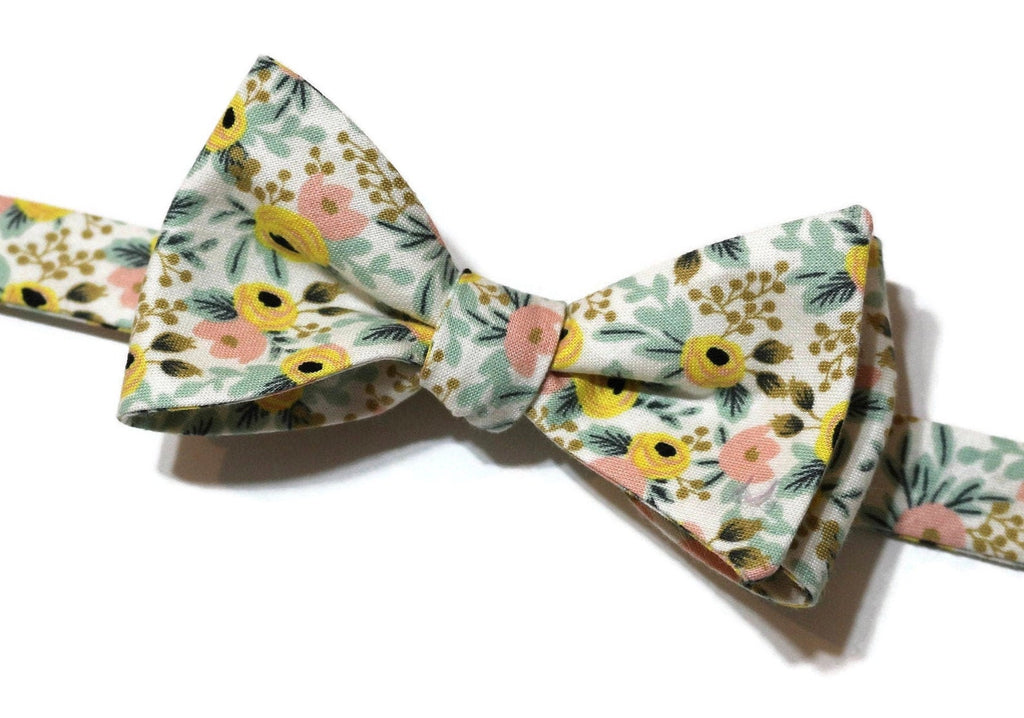 Cream Rosa Floral Bow Tie showcasing unique floral patterns, handcrafted neckties for men, boys, and wedding accessories.
