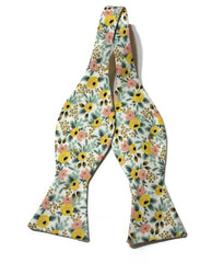 Cream Rosa Floral Bow Tie featuring a vibrant floral pattern, perfect for men’s formal wear and special occasions.