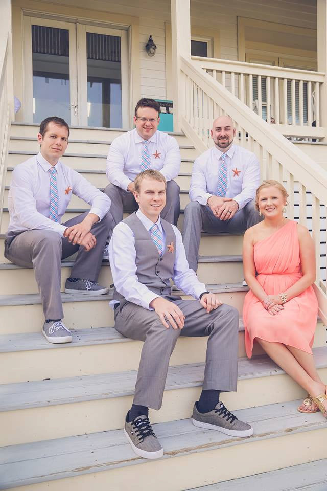 Turquoise & Coral Tattersall Necktie worn by groomsmen at a wedding, showcasing handcrafted neckties and formal wear accessories for men.