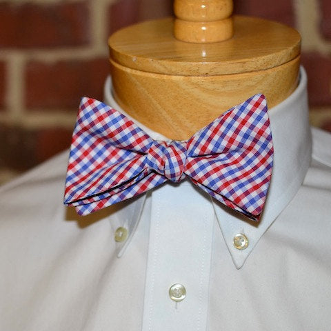 Red & Blue Tattersall Check Bow Tie displayed on a dress shirt, showcasing handcrafted neckties for men.
