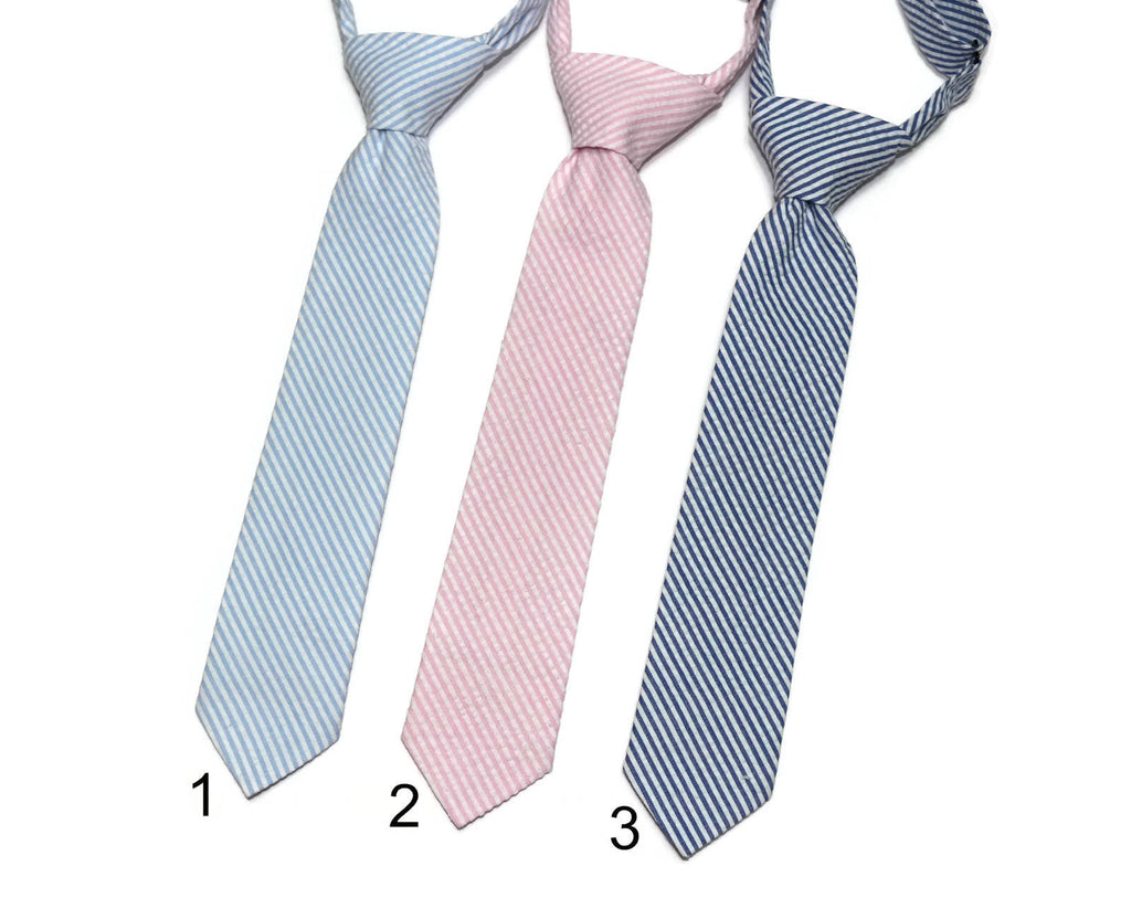Seersucker Necktie - Boys Pre-Tied in blue, pink, and navy stripes showcasing handcrafted neckties.