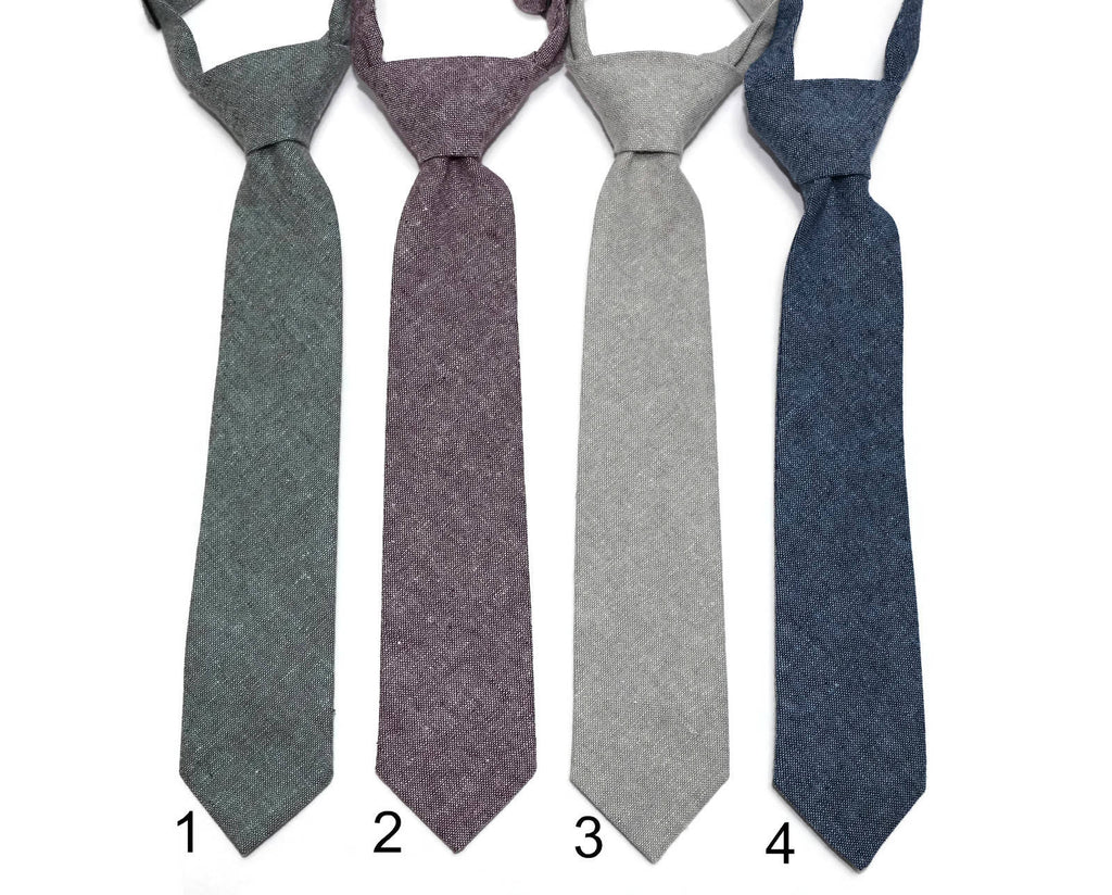 Linen Neckties - Boys Pre-Tied in four colors: green, purple, gray, and blue, featuring unique floral and plaid patterns.