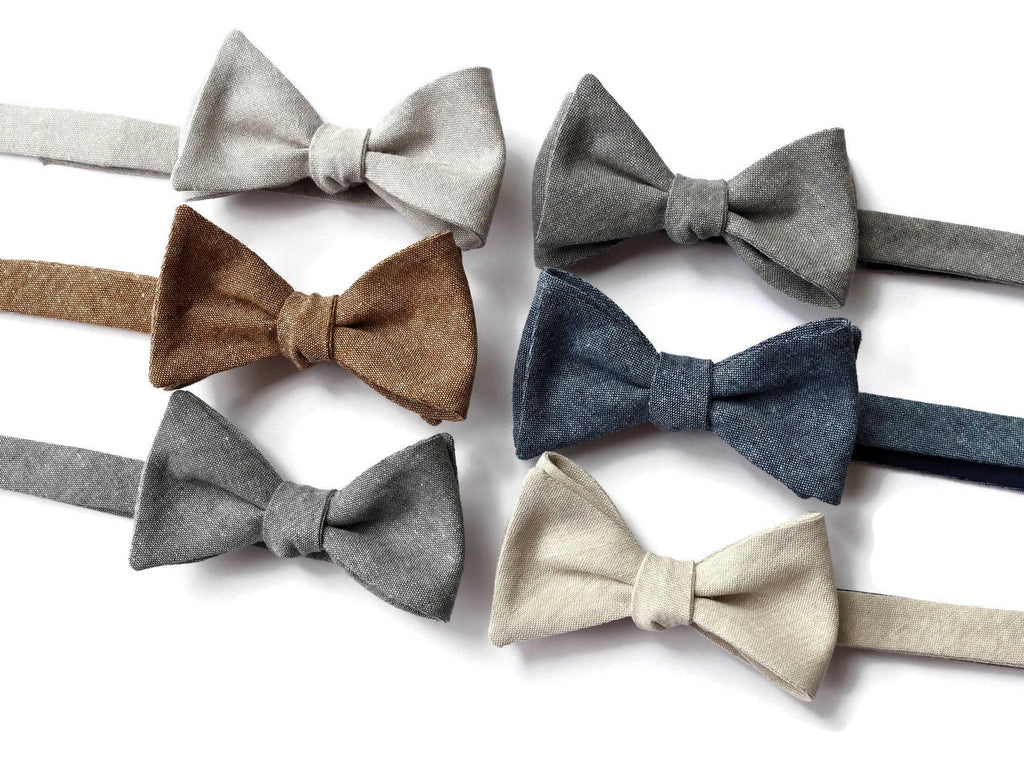 Linen Bow Tie collection showcasing light gray, brown, shale, grayl, nautical, and natural options. Handcrafted neckties and accessories.