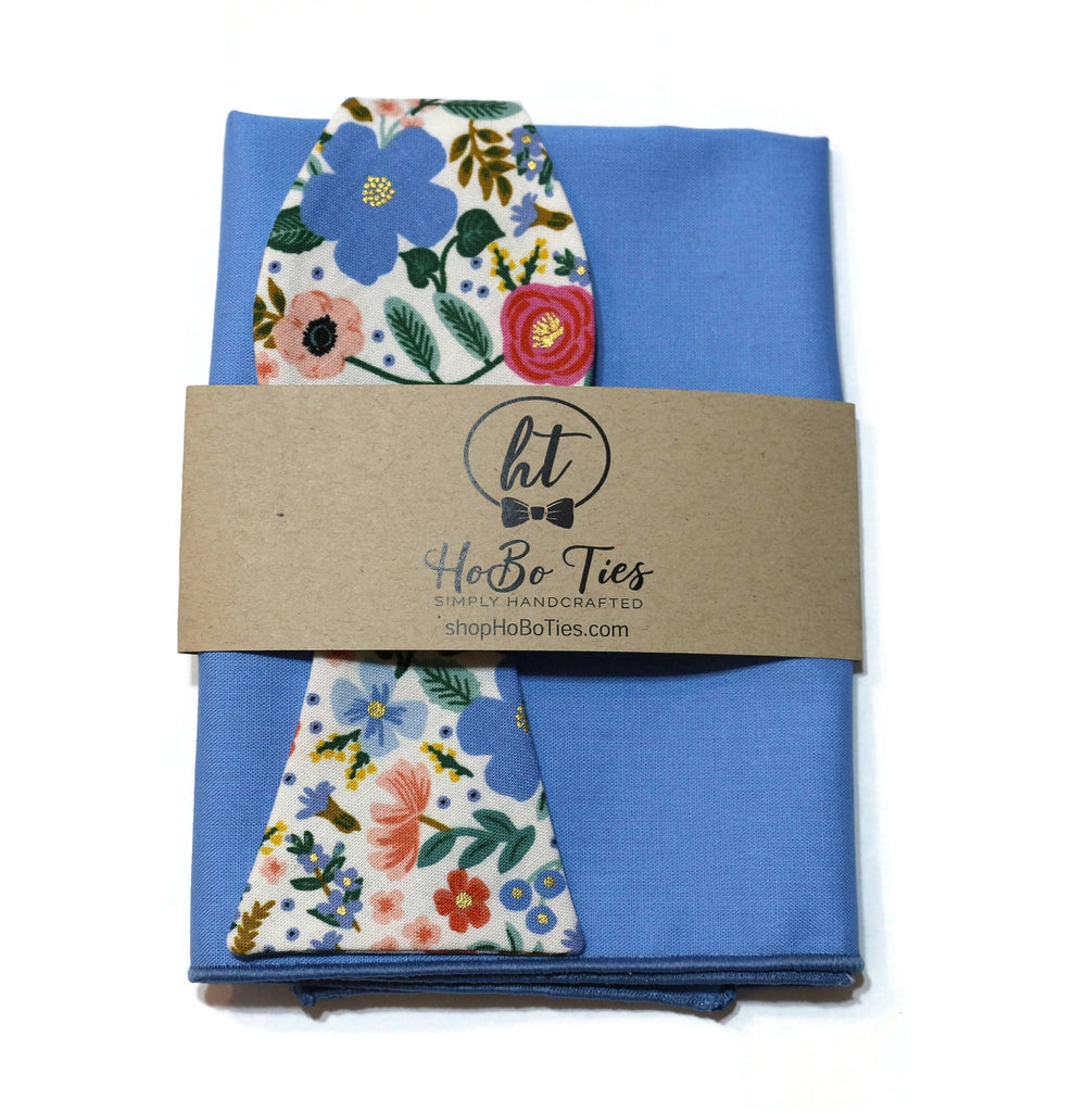 Cream Wild Rose Floral Bow Tie with blue pocket square, handcrafted accessories for men and boys by HoBo Ties.