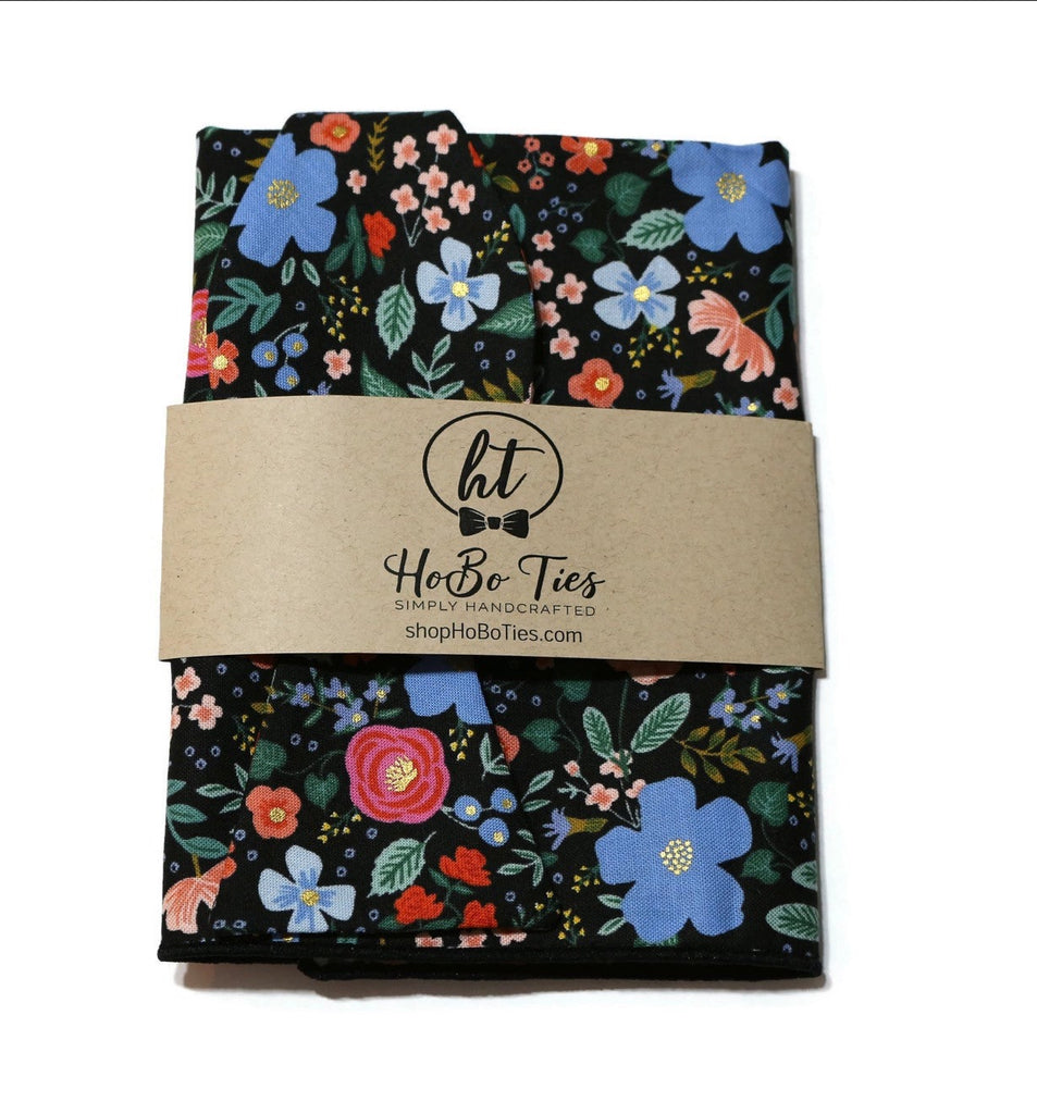 Black Wild Rose Floral Bow Tie showcased with floral patterns on a dark background, perfect for men's formal wear accessories.