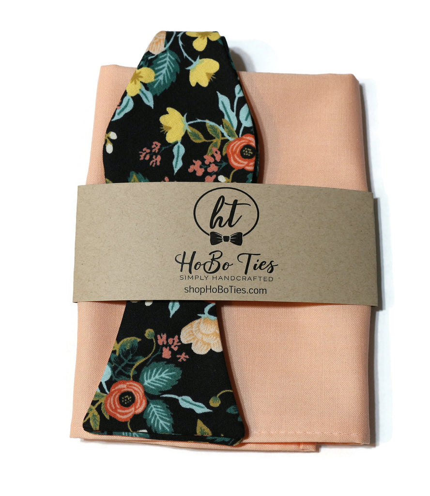 Black Birch Floral Bow Tie paired with a peach pocket square, perfect for men’s formal wear accessories.