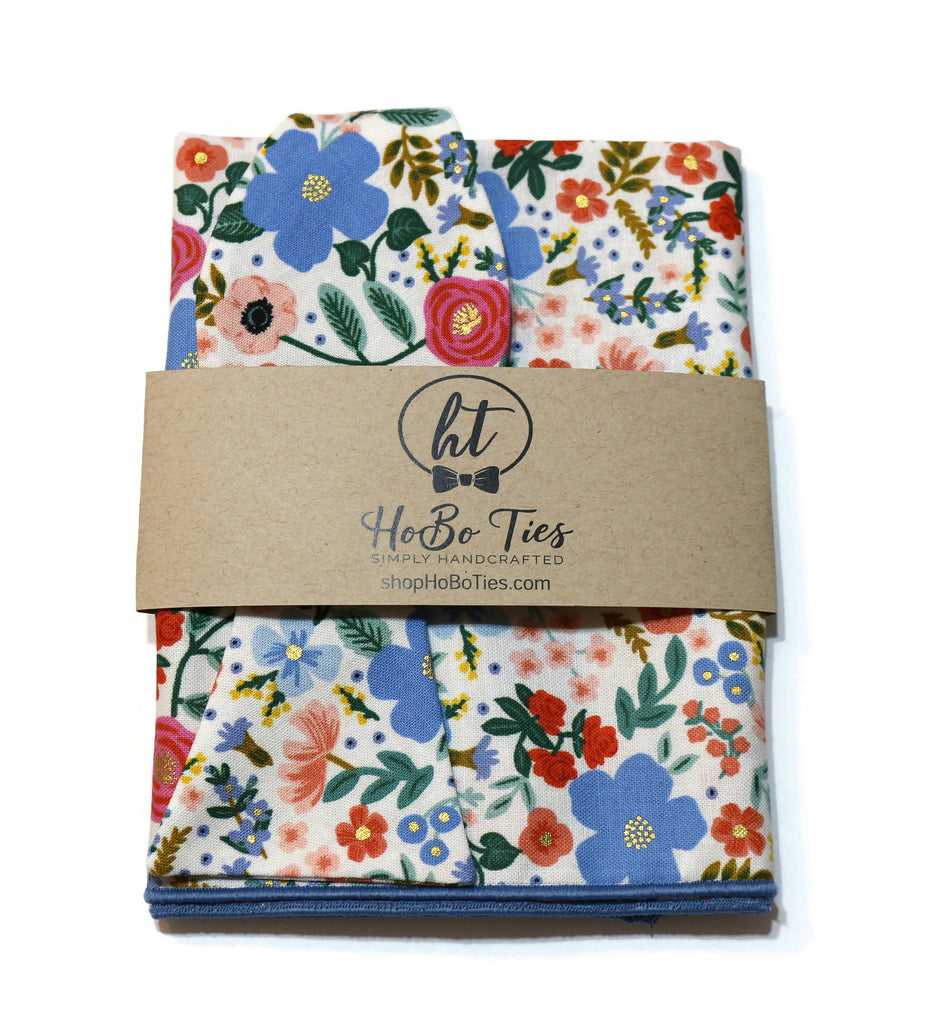 Cream Wild Rose Floral Bow Tie with vibrant floral patterns and a handcrafted design, ideal for men's formal wear accessories.