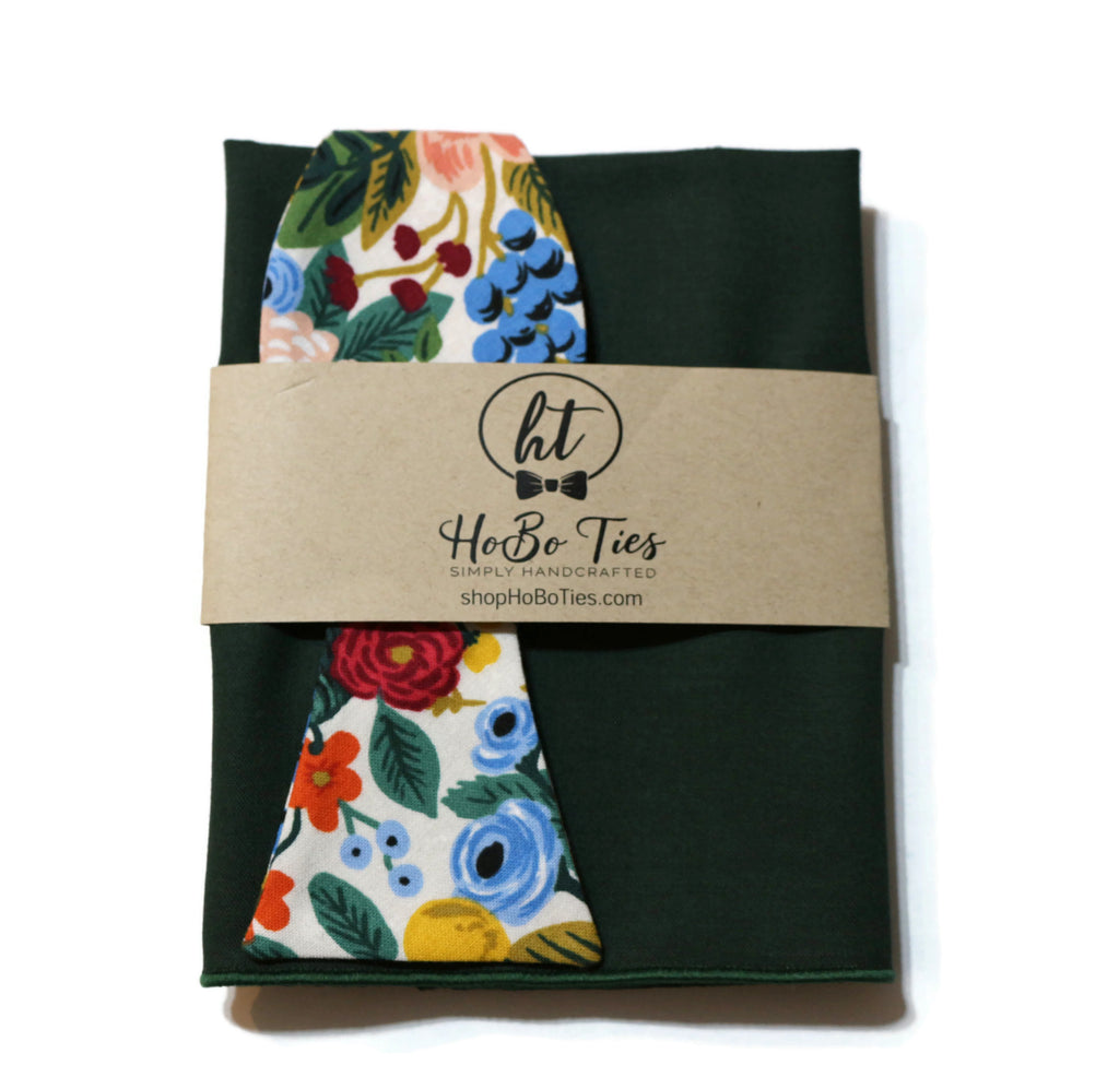 Cream Garden Party Floral Bow Tie paired with green fabric, handcrafted neckties for men and boys, perfect for weddings and formal occasions.