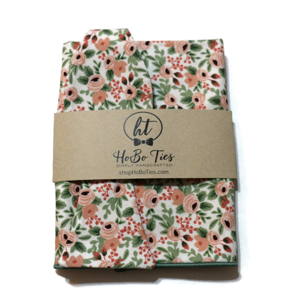 Rose Rosa Floral Bow Tie featuring a floral design and packaged with a handcrafted label for men’s formal wear accessories.