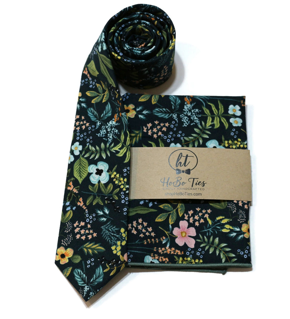 Navy Amalfi Floral Necktie displayed with matching pocket square, handcrafted neckties for men, floral necktie design.