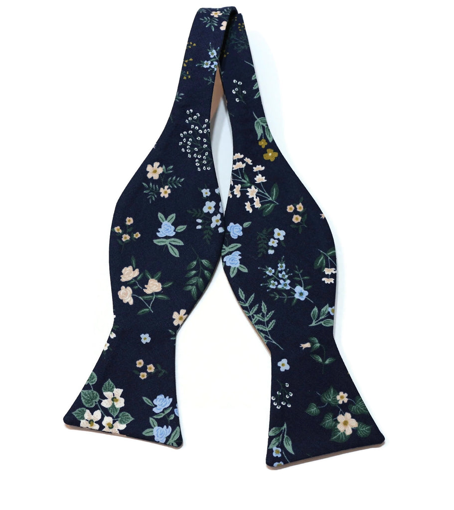 Navy Hawthorne Floral Bow Tie, a handcrafted necktie featuring floral patterns perfect for men's wedding accessories.