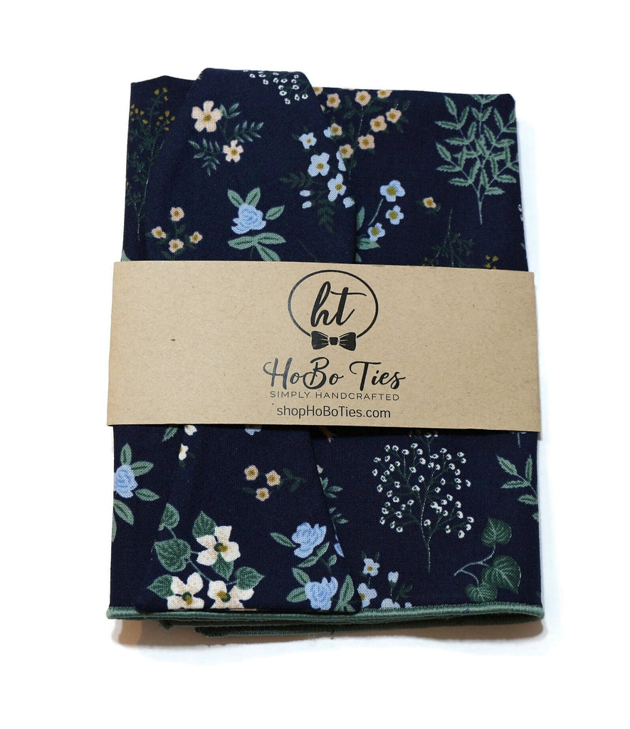Navy Hawthorne Floral Bow Tie, a handcrafted necktie with floral pattern, perfect for unique men's wedding accessories.