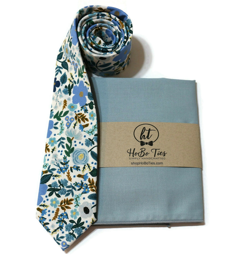 Blue Wild Rose Floral Necktie with matching pocket square and rolled tie, handcrafted neckties and accessories for men.