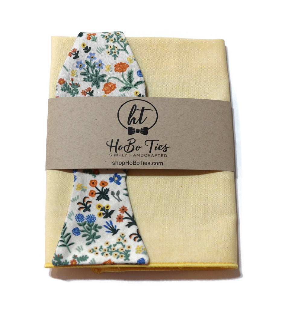 Cream Menagerie Garden Floral Bow Tie with custom packaging and floral design fabric, handcrafted necktie for men.