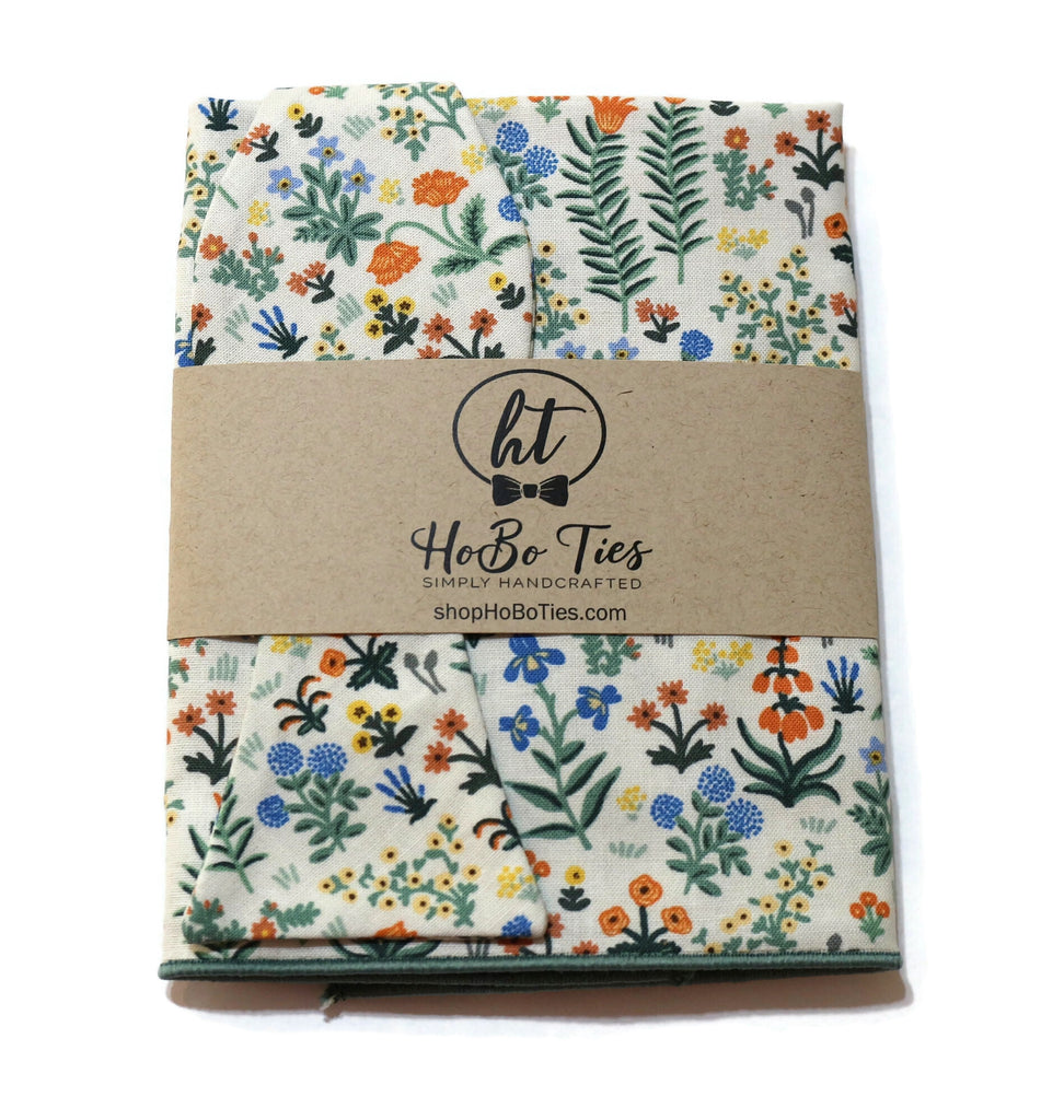 Cream Menagerie Garden Floral Bow Tie packaging showcasing vibrant floral design and handcrafted quality.