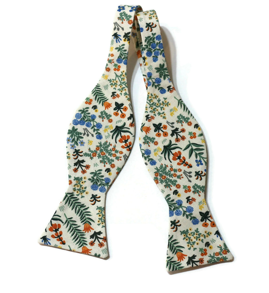Cream Menagerie Garden Floral Bow Tie featuring colorful floral patterns, handcrafted neckties and men's formal wear accessories.