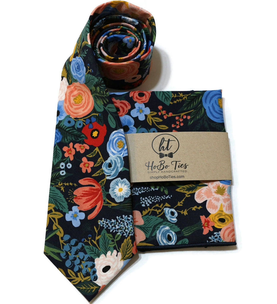 Navy Garden Party Floral Necktie featuring vibrant flowers and complementary pocket square, handcrafted neckties for men.