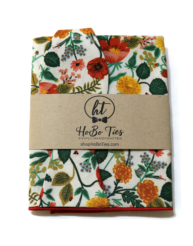 Cream Poppy Fields Floral Bow Tie - Handcrafted neckties featuring vibrant floral patterns for men and boys.