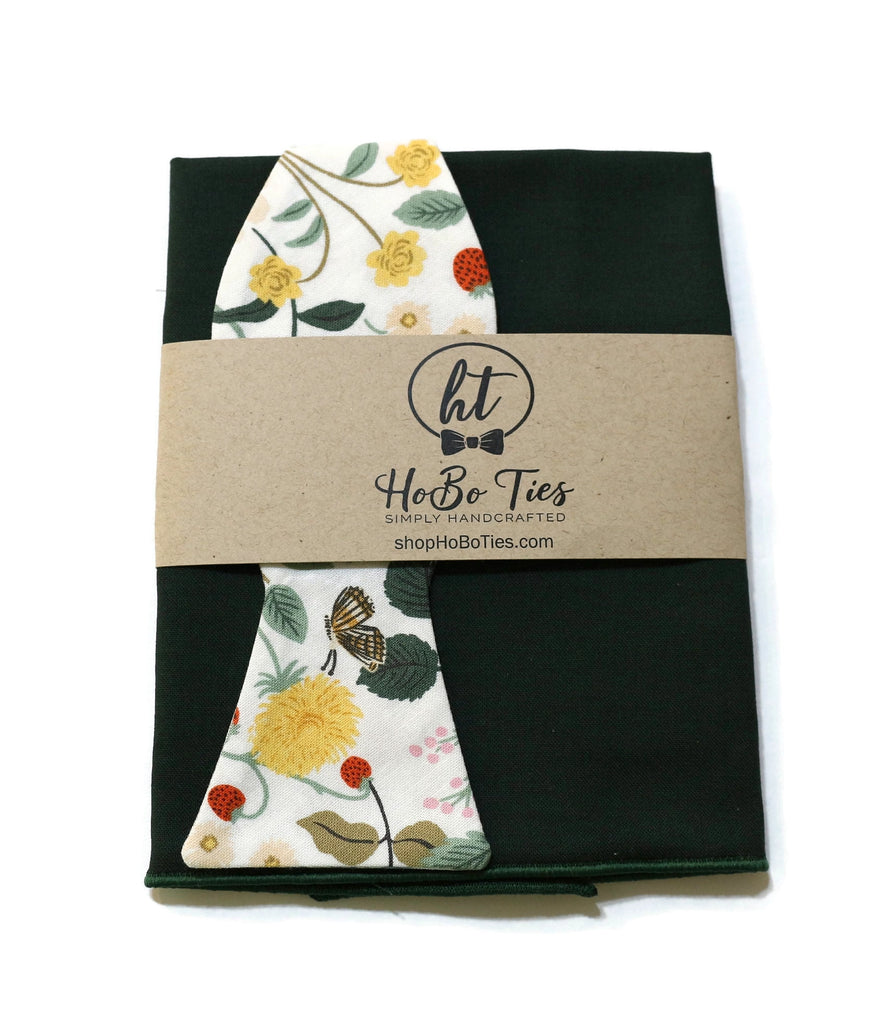 Ivory Strawberry Fields Floral Bow Tie packaging with floral design, handcrafted neckties and men's accessories.