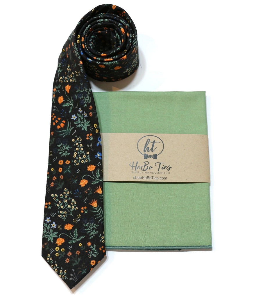Black Menagerie Garden Floral Necktie displayed with matching pocket square, perfect for wedding accessories and handmade men's accessories.